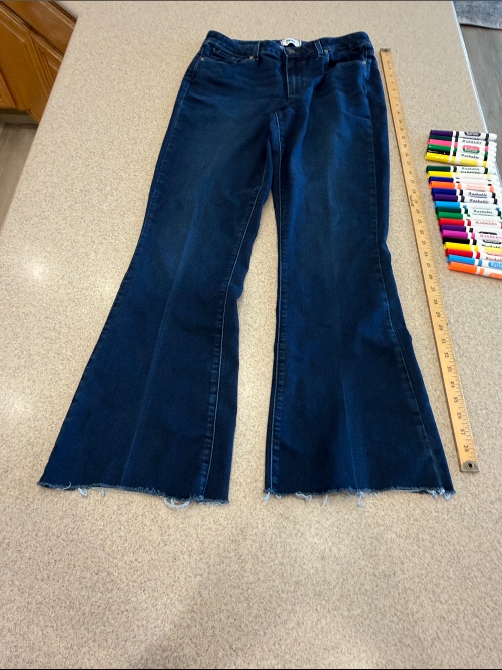 PAIGE Deep Indigo Flare Jeans with Raw Hem high rise Bell Canyon size 31